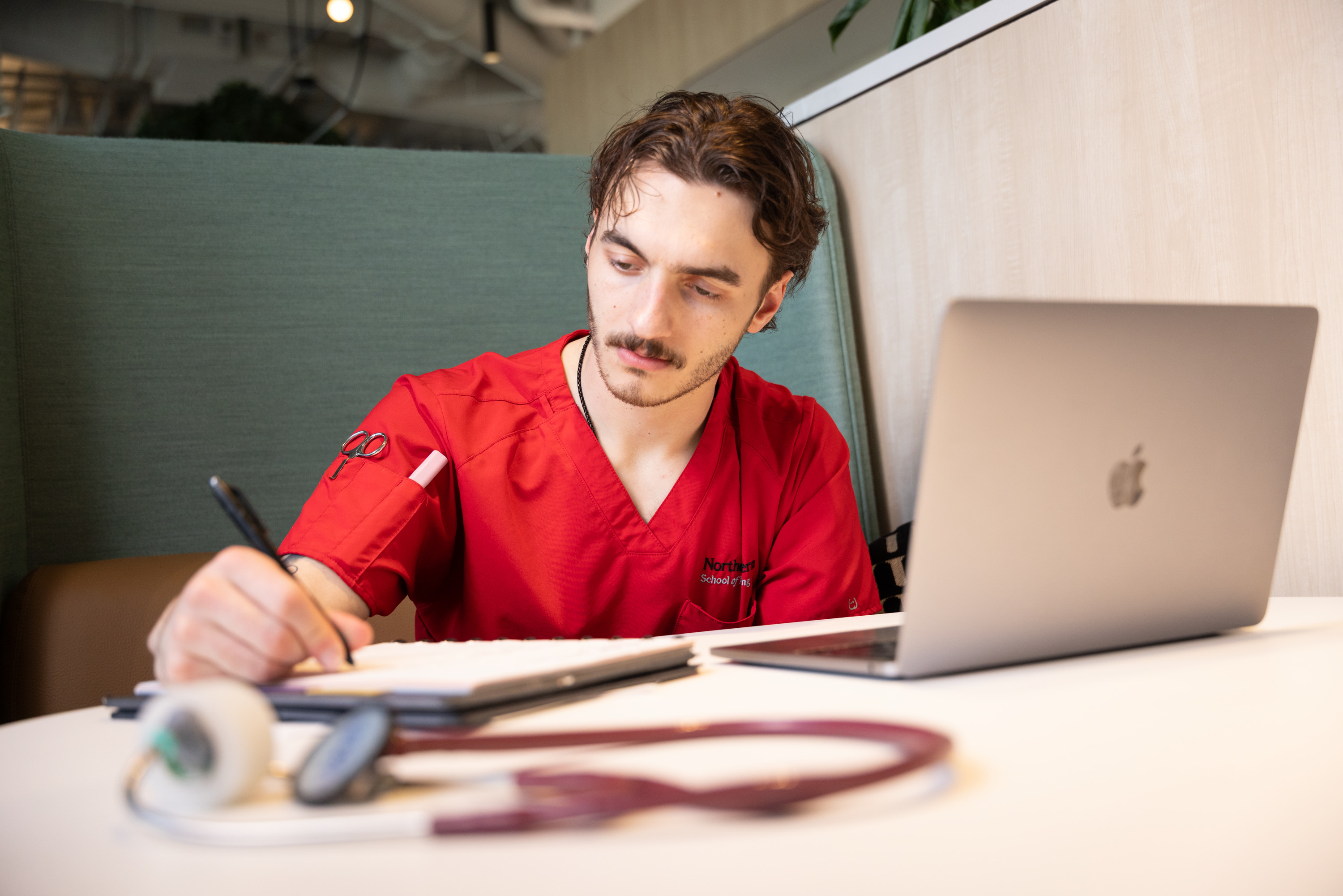 Northeastern Charlotte ABSN student studying online