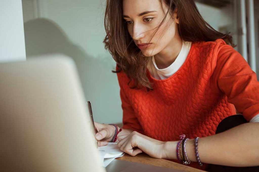 student studying on laptop