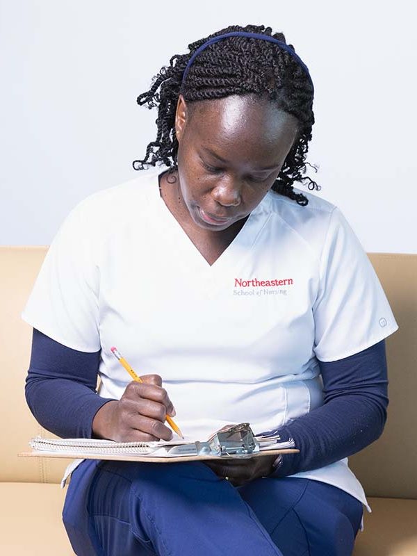 nursing student taking notes