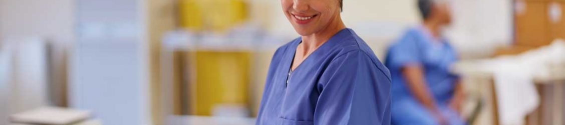 NEU absn student smiling at patient